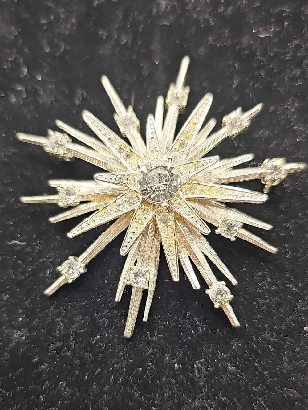 Sparkling vintage Starburst Brooch, By AVON Silver-Tone Crystal Accent
